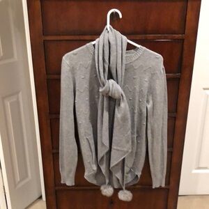 Grey sweater with pockets and scarf to match. Ribbed sleeves and hem.